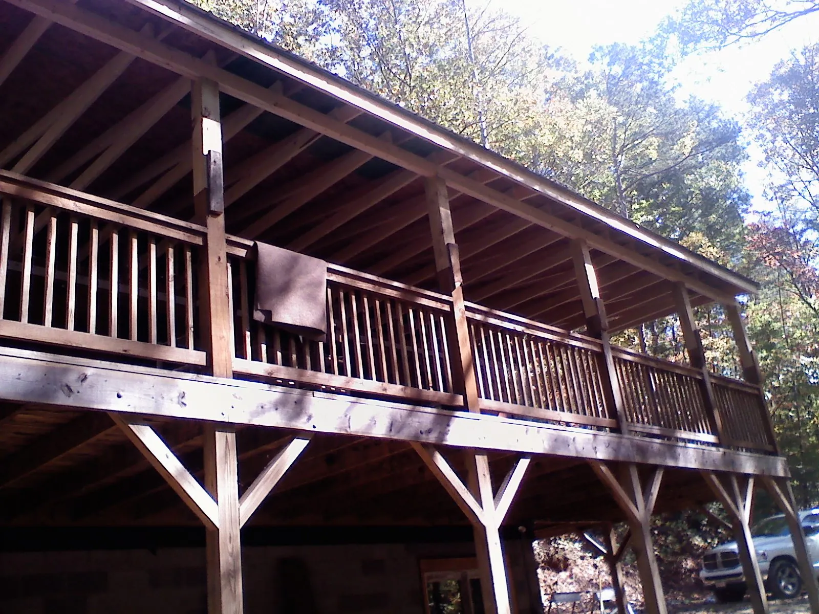 Timber framing under a new elevated porch and deck — Roof Leak Repair in Spencer by Roofing Brothers